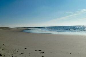 das endlos Strand beim das Nord Meer hvidbjerg stranden blavand Dänemark foto