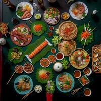 oben Aussicht von Tabelle Abendessen Vietnamesisch. Knolling Fotografie von Familie Abendessen Neu Jahr , beschwingt. Vietnamesisch traditionell Mahlzeit im Land Seite. eben legen. foto