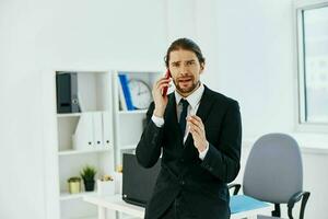 Geschäftsmann halten ein Telefon Telefon Büro Exekutive foto