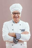 Porträt von ein Senior Koch foto