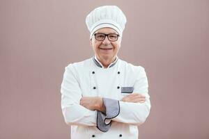 Porträt von ein Senior Koch foto