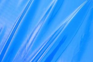 blauer Polyethylenhintergrund mit Falten foto