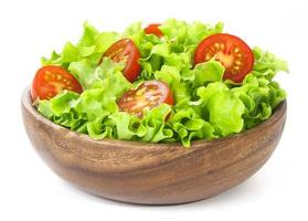 Tomate und Salat lokalisiert auf weißem Hintergrund foto