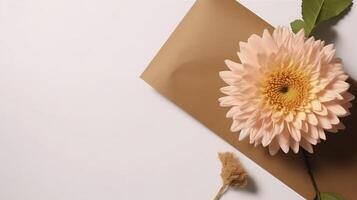 oben Aussicht von leer Kraft Papier Attrappe, Lehrmodell, Simulation mit schön Chrysantheme Blume, Blatt auf Weiß Hintergrund. generativ ai. foto