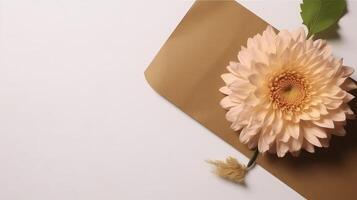oben Aussicht von leer Kraft Papier Attrappe, Lehrmodell, Simulation mit schön Chrysantheme Blume, Blatt auf Weiß Hintergrund. generativ ai. foto