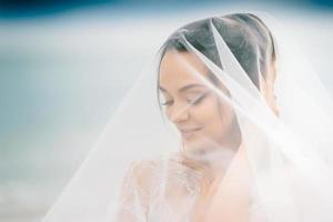 Braut Nahaufnahme unter einem Schleier foto
