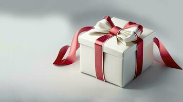 3d machen von Weiß Geschenk Box mit rot Seide Bogen Band auf grau Hintergrund und Kopieren Raum. foto