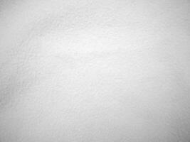 Flanell fühlte Weiß Sanft Rau Textil- Material Hintergrund Textur schließen Auf, Schürhaken Tischtennis Kugel, Tisch Tuch. Fries Weiß Stoff Hintergrund. foto
