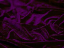 lila Samtstoffstruktur als Hintergrund verwendet. leerer lila stoffhintergrund aus weichem und glattem textilmaterial. Es gibt Platz für Text. foto