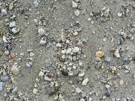 ein schließen oben von Stapel von Sand mit Kieselsteine zum Beton Zement mischen oder Granatwerfer. zum Konstruktion Hintergrund oder Hintergrund. Nein Menschen foto