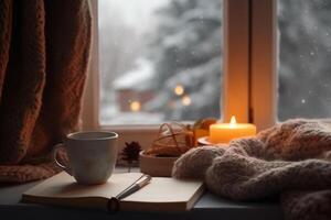 Weihnachten Hintergrund. ein Tasse von Tee, Bücher, ein Kerze und ein gestrickt Schal auf das Fenster Hintergrund. ai generativ foto