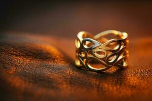 Luxus Gelb Gold Ring auf Leder Hintergrund foto
