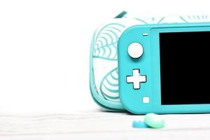 Gaming-Hintergrund mit Switch Lite foto