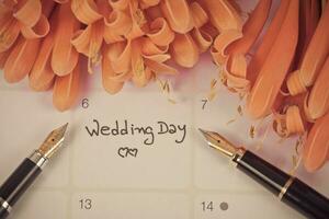 Erinnerung Hochzeit Tag im Kalender Planung und Brunnen foto