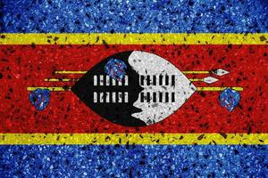 Flagge von Königreich von eswatini auf ein texturiert Hintergrund. Konzept Collage. foto