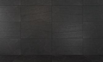 Hintergrund dunkle Wand aus Betonplatten