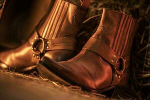 Cowboy Stiefel im das Scheune foto