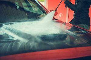 Auto Waschen mit Druck foto
