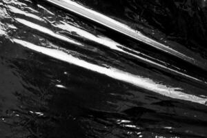 schwarz transparent Plastik Film wickeln Overlay Textur Hintergrund foto