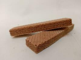 köstlich Schokolade Wafer auf Weiß Hintergrund foto