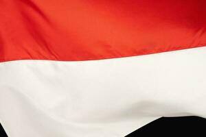 indonesisch National Flagge zum Banner Hintergrund foto