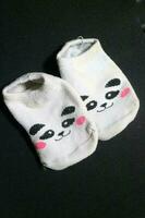 süß Baby Socken mit Panda Gesichter foto