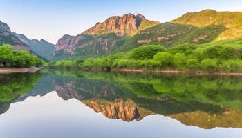 majestätisch Berg Angebot spiegelt im still Teich, Herbst natürlich Schönheit generiert durch ai foto