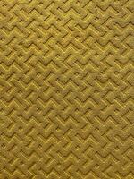 Gold Farbe Samt Vorhänge Textil. Muster Hintergrund. foto