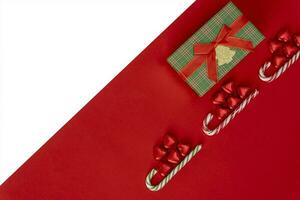 Weihnachten Hintergrund mit ein Schlitten, Süßigkeiten und ein Karamell Stock foto