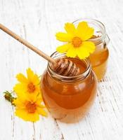 Honig mit Blumen foto
