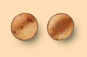 Kokosnuss leeren Schale oben Aussicht isoliert auf nackt Farbe foto