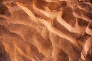 goldener rauer Sand natürlicher Hintergrund