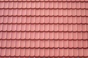 Dachziegel nahtlose Musterabdeckung auf Haus foto