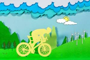 Radfahrer stilisiert auf Papier schneiden, Straße Radfahren, Radfahren Schiene, Fahrrad im Landschaft. foto