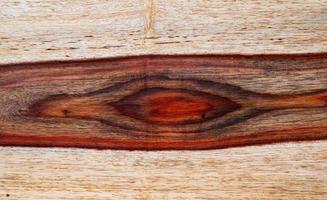 Palisander-Holzstruktur-Hintergrundoberfläche mit natürlichem Muster foto