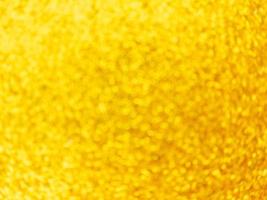 goldene Unschärfe beleuchtet Hintergrund festlich abstrakt wirbelndes Bokeh foto