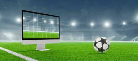 Computer Anzeige Tor Netz Konzept. Fußball Stadion im Hintergrund. Fußball Ball auf das Gras foto