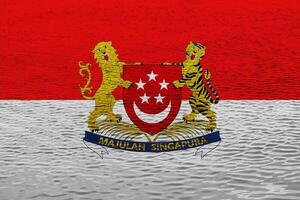 Flagge von Singapur auf ein texturiert Hintergrund. Konzept Collage. foto