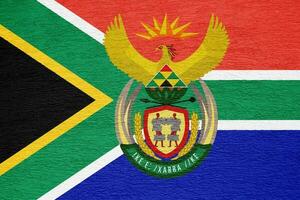 Flagge von Republik von Süd Afrika auf ein texturiert Hintergrund. Konzept Collage. foto