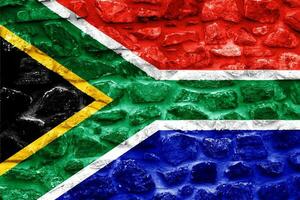 Flagge von Republik von Süd Afrika auf ein texturiert Hintergrund. Konzept Collage. foto