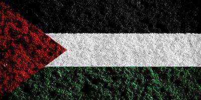 Flagge von Zustand von Palästina auf ein texturiert Hintergrund. Konzept Collage. foto