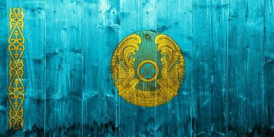 Flagge von und Mantel von Waffen Republik von Kasachstan auf ein texturiert Hintergrund. Konzept Collage. foto