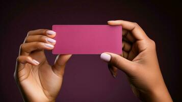 weiblich Hände halten ein Magenta leer Geschäft Karte, Nahansicht Schuss. generativ ai. foto