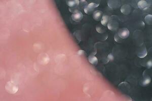 schwarz und Rosa abstrakt funkeln Hintergrund mit glänzend Bokeh foto