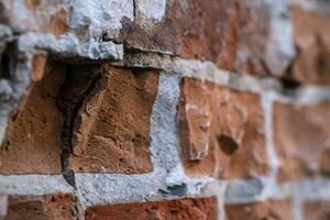 das Textur von ein Orange Backstein alt Mauer. foto