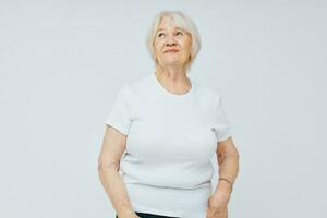 Porträt von ein alt freundlich Frau Gesundheit Lebensstil Licht Hintergrund foto