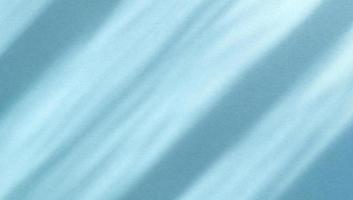 diagonale Schatten auf blaugrünem Papier. abstrakter Hintergrund. Stock Foto. foto