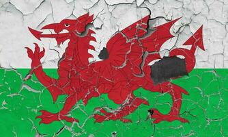 3d Flagge von Wales auf ein alt Stein Mauer Hintergrund. foto