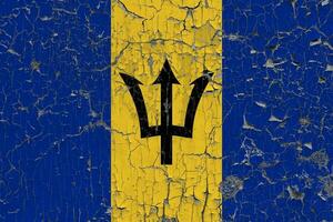 3d Flagge von Barbados auf ein alt Stein Mauer Hintergrund. foto