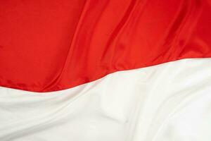 wellig indonesisch National Flagge Textur foto